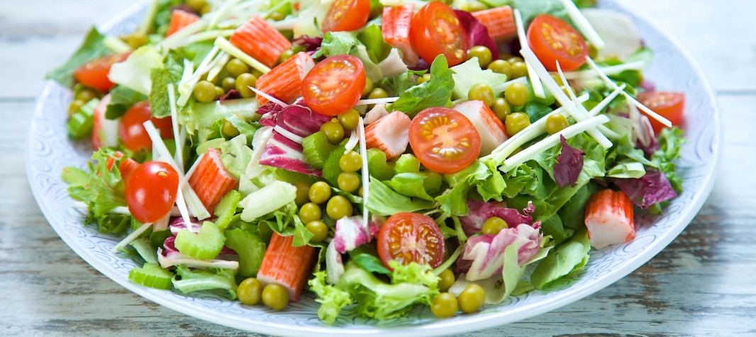 Salad with peas and surimi